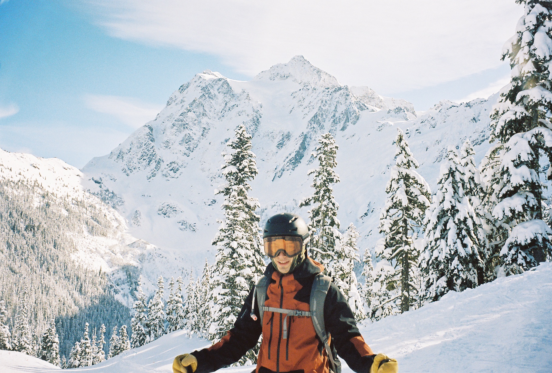 Sean-Michael skiing in front of Mt Shuksan
